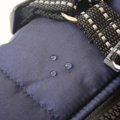 Waterproof pet harness and vest for dogs, close-up detail.